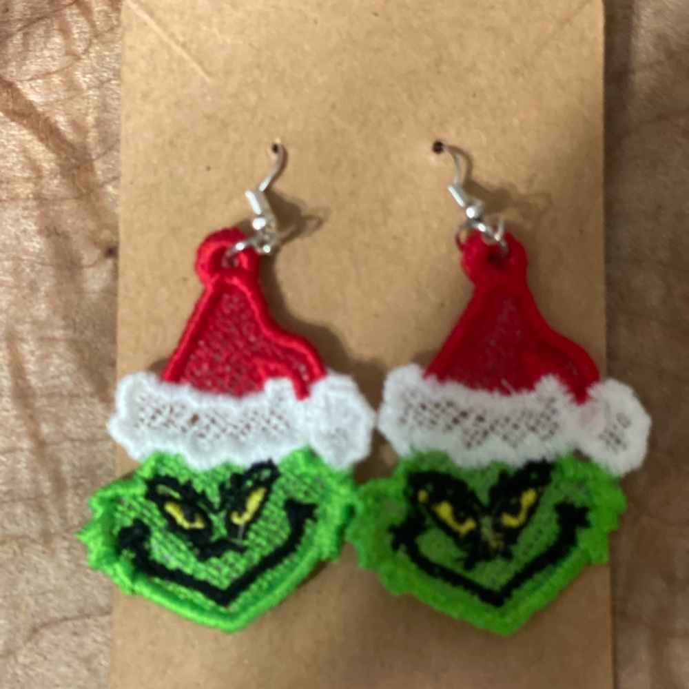 Embroidered FSL dangling Mr. Mean One Himself Earrings. Very light weight.